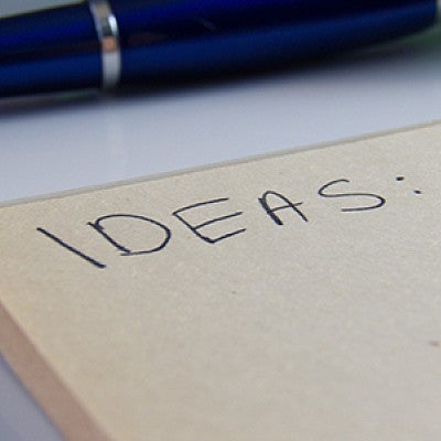 'ideas' written on notepad 'ideas' written on notepad