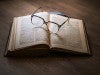 Open book with glasses Open book with glasses